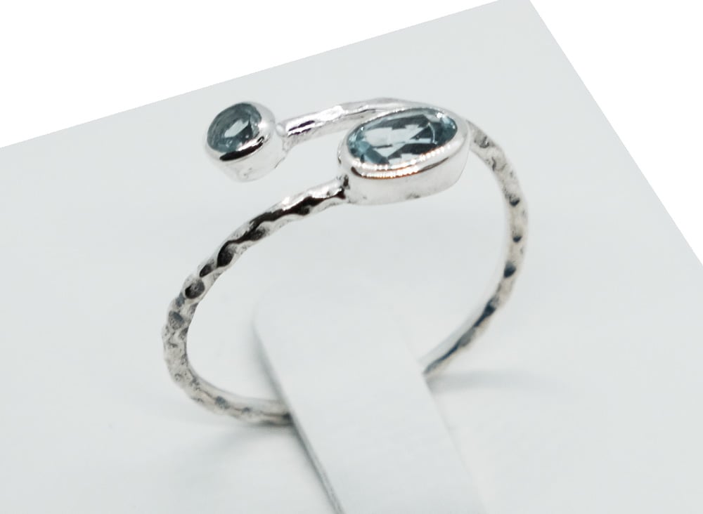 Silver Ring Twist Cut Topaz